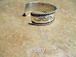 SUBSTANTIAL Vintage Navajo Sterling Silver STAMPED BIRD Design Bracelet