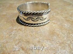 SUBSTANTIAL Vintage Navajo Sterling Silver STAMPED BIRD Design Bracelet