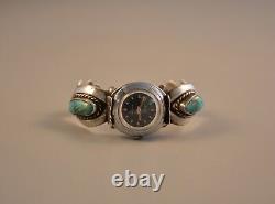 Bracelet de montre en argent sterling moulé Navajo d'époque avec turquoises taille 6 3/4.