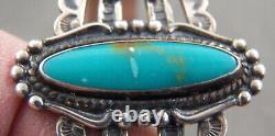 Bracelet vintage en argent sterling et turquoise avec des motifs de cloche et de bijoux indiens.